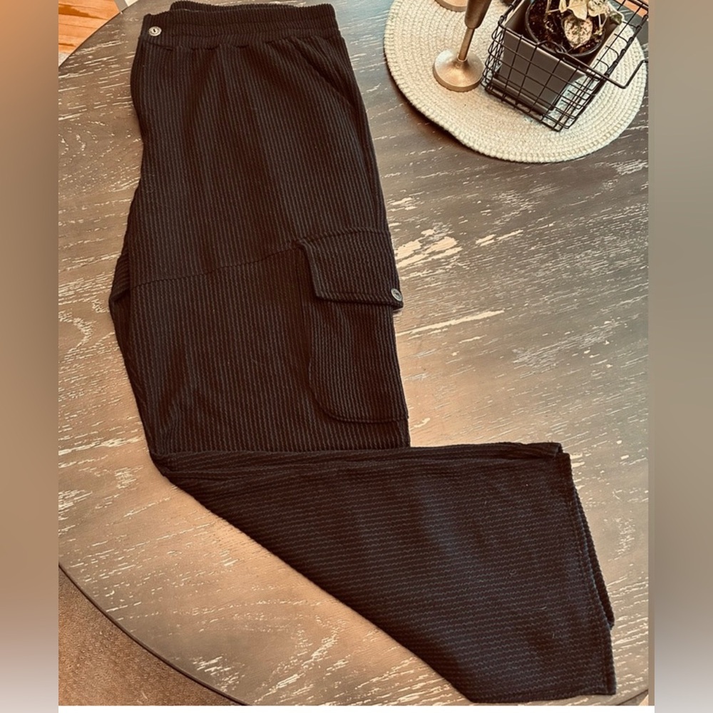 Size Large/XL very cute boutique pants.  Very soft and very stretchy!